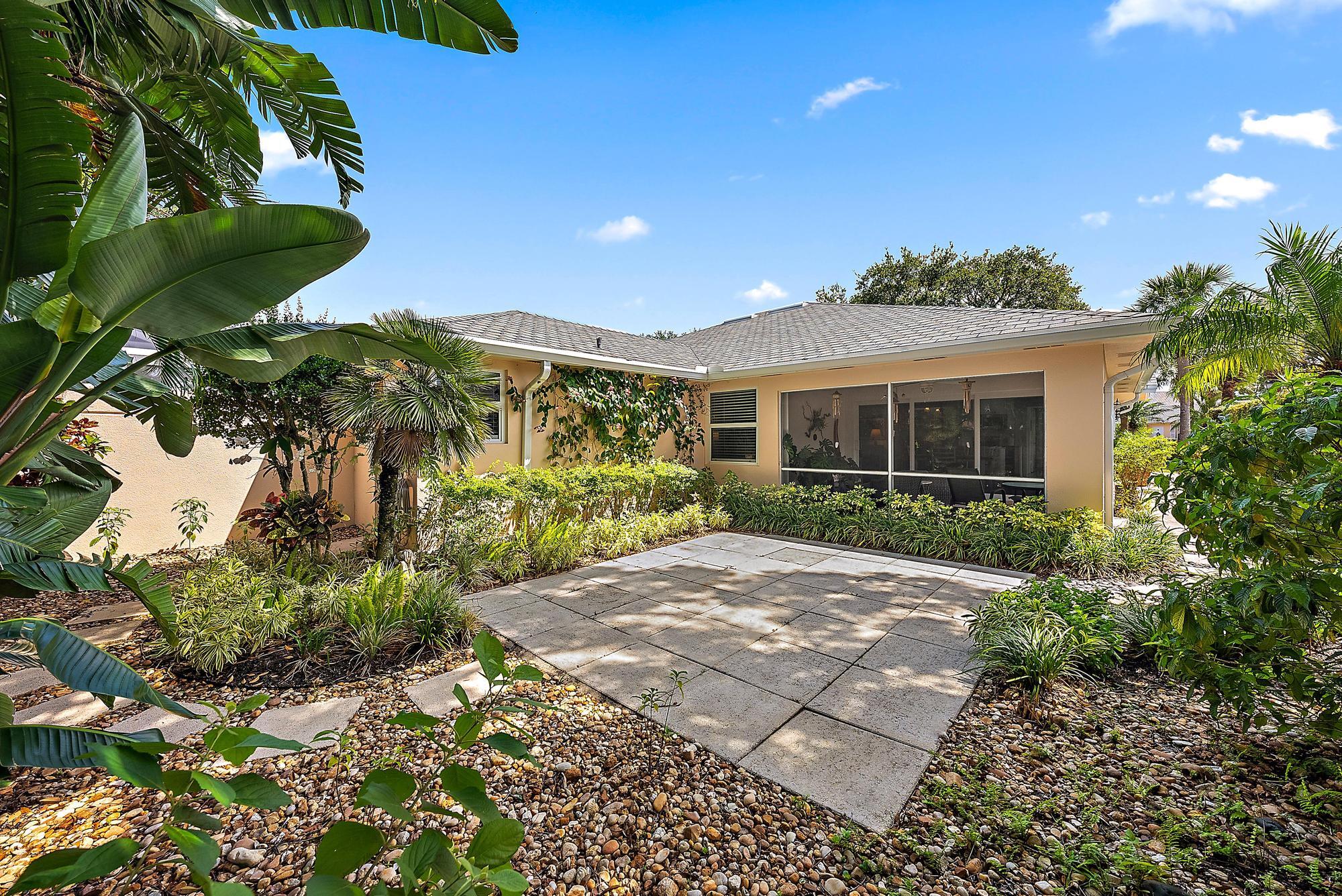 197 Brier Circle Jupiter, FL 33458 - Photo 21 of 33 a view of a house with a street