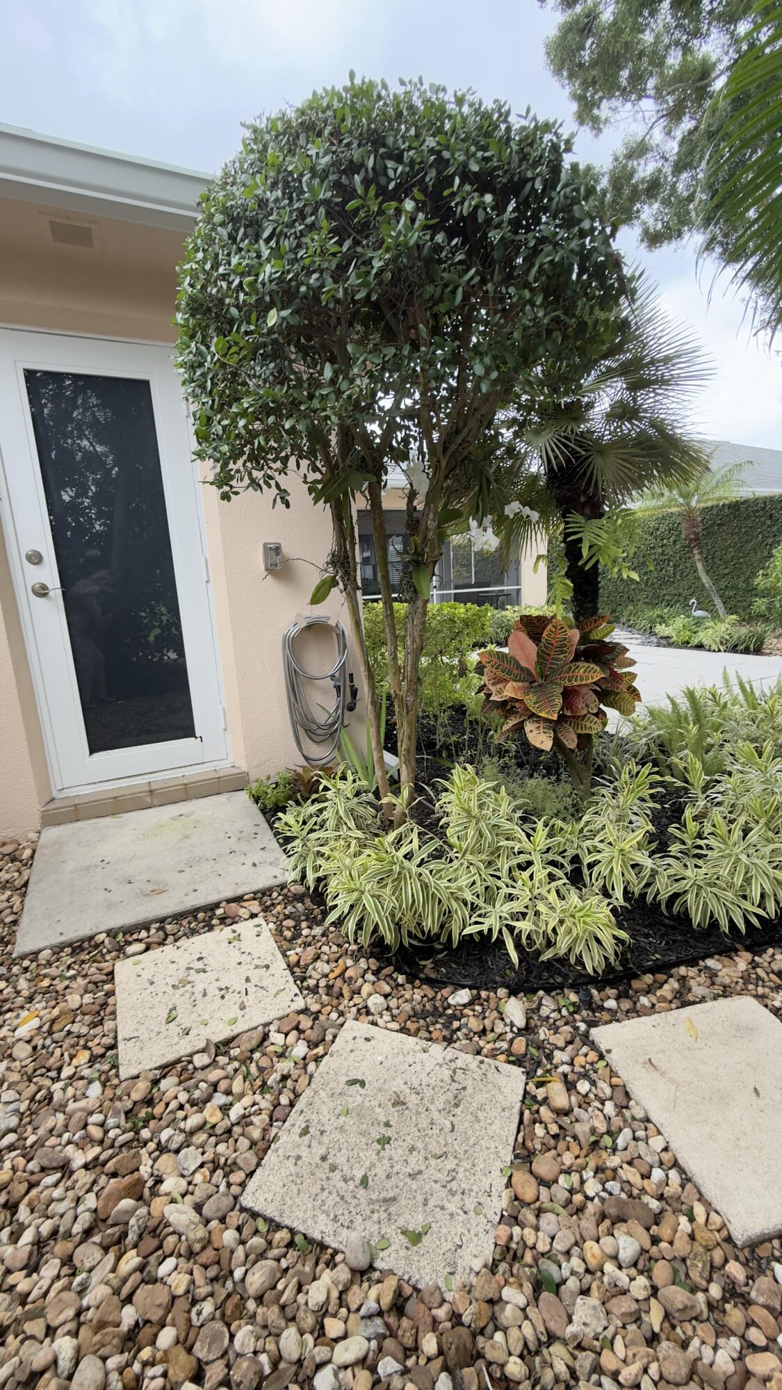 197 Brier Circle Jupiter, FL 33458 - Photo 23 of 33 a view of a garden
