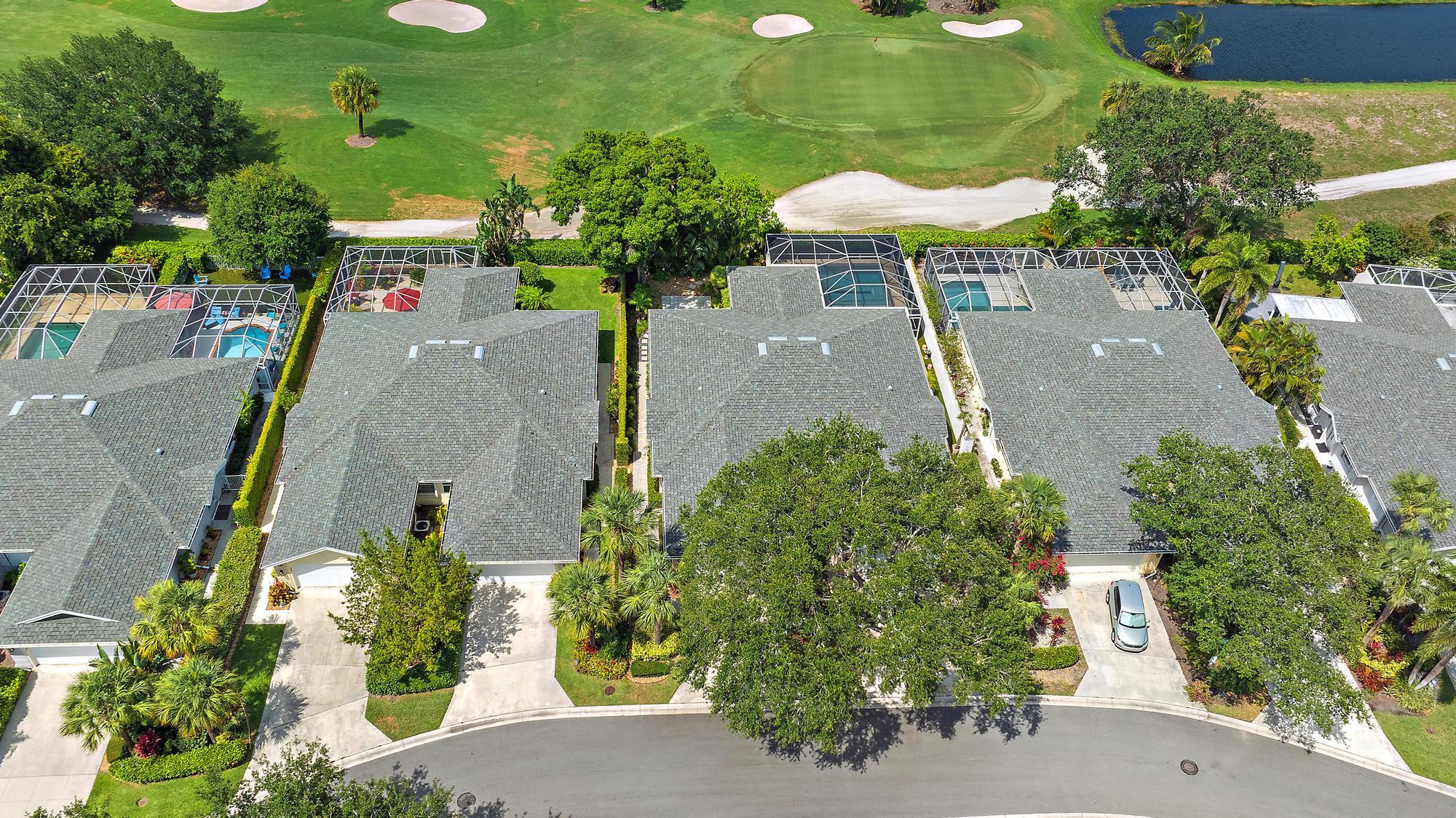 197 Brier Circle Jupiter, FL 33458 - Photo 27 of 33 an aerial view of a house with a yard