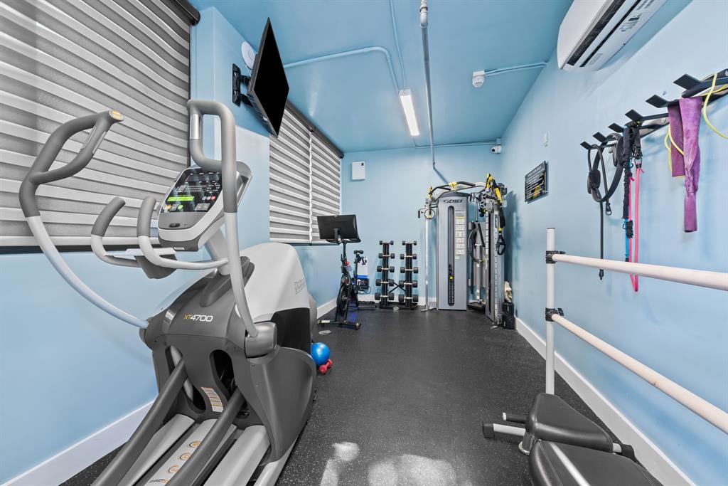 60 Hendricks Isle, Unit 301 Fort Lauderdale, FL 33301 - Photo 30 of 31 a view of a room with gym equipment