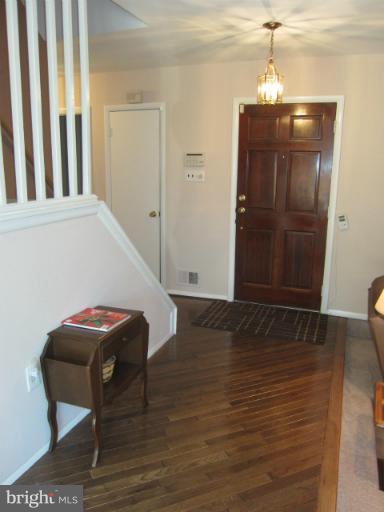 14905 Wellwood Road Silver Spring, MD 20905 - Photo 13 of 30 Foyer with Hardwood Floors