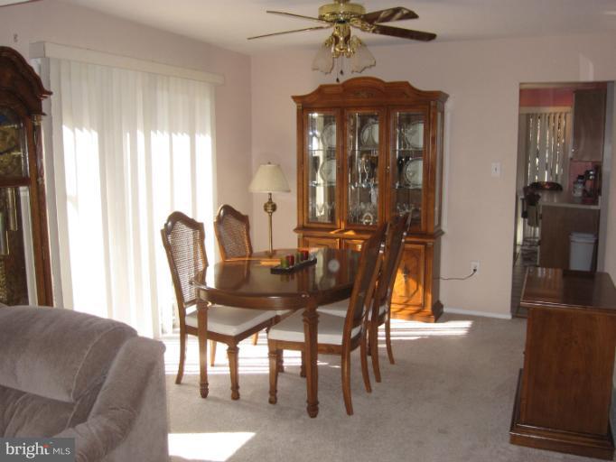 14905 Wellwood Road Silver Spring, MD 20905 - Photo 14 of 30 Dining Room Opens to Living Room and Kitchen