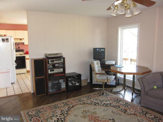 14905 Wellwood Road Silver Spring, MD 20905 - Photo 16 of 30 Family Room opens to kitchen