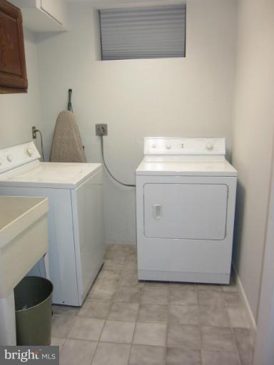 14905 Wellwood Road Silver Spring, MD 20905 - Photo 24 of 30 Separate laundry room in lower level with sink