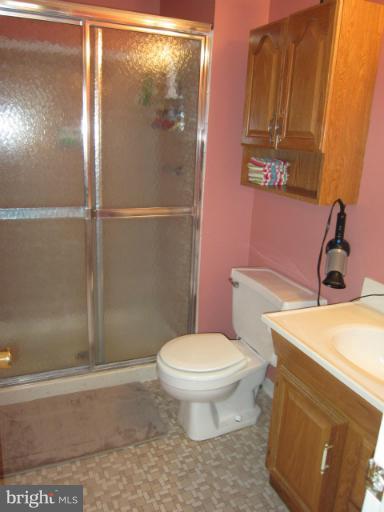 14905 Wellwood Road Silver Spring, MD 20905 - Photo 7 of 30 Master bath with glass shower doors