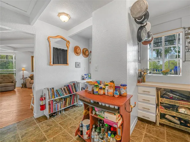 a room with furniture and a baby crib