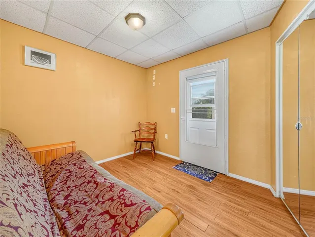 a view of a room with a wooden floor