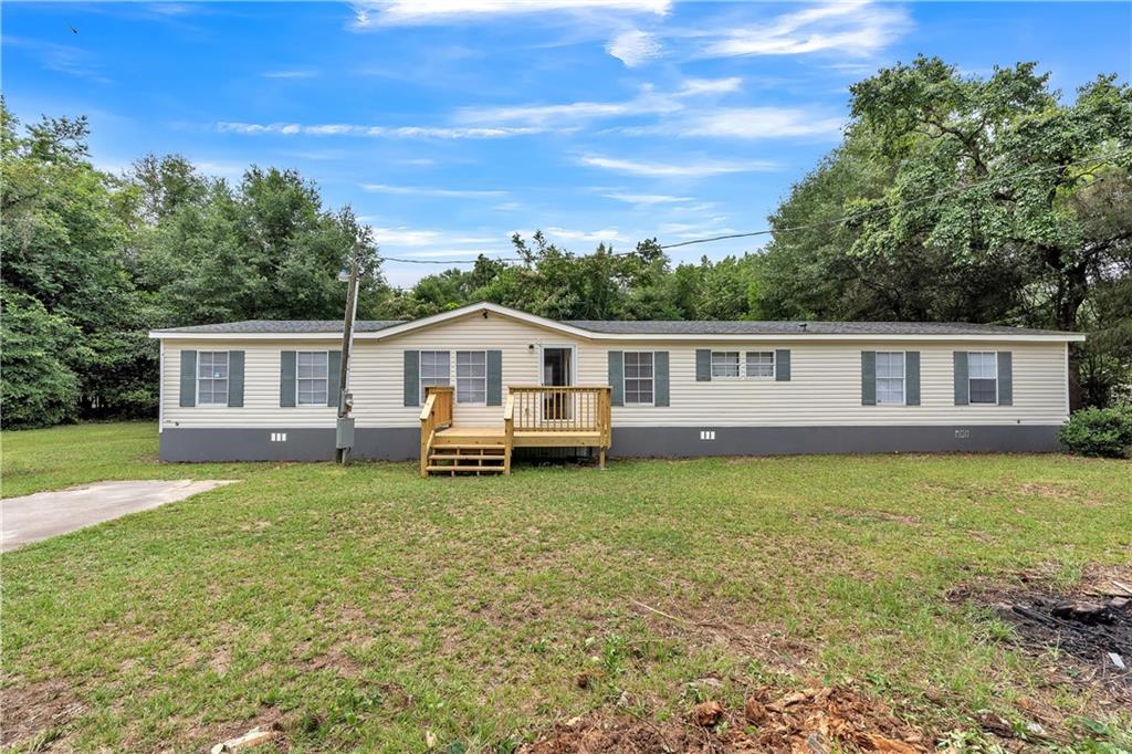1044 Horseshoe Road Augusta, GA 30906 - Photo 1 of 1 a view of a house with a backyard