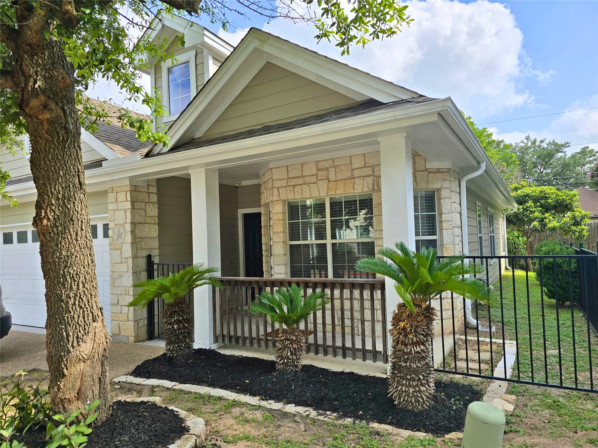 6715 Windrift Way, Unit 28 Austin, TX 78745 - Photo 2 of 19 A charming exterior and front porch welcomes you home.