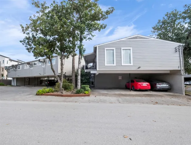 a car parked in front of a house