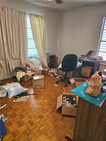 a room with gym equipment and a window