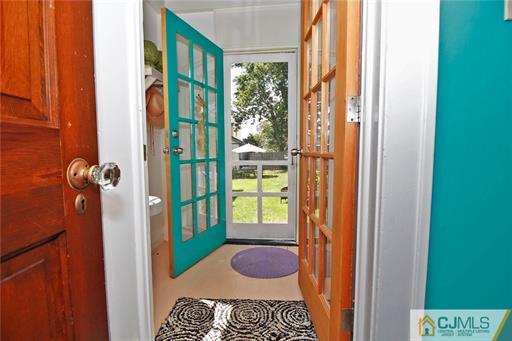 67 Pleasant Avenue Edison, NJ 08837 - Photo 15 of 25 a bathroom with a sink and a shower curtain