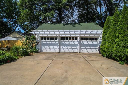 67 Pleasant Avenue Edison, NJ 08837 - Photo 25 of 25 front view of house with a yard