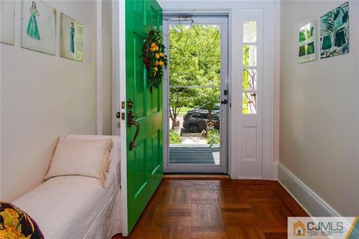 67 Pleasant Avenue Edison, NJ 08837 - Photo 5 of 25 a view of livingroom with furniture and floor to ceiling window