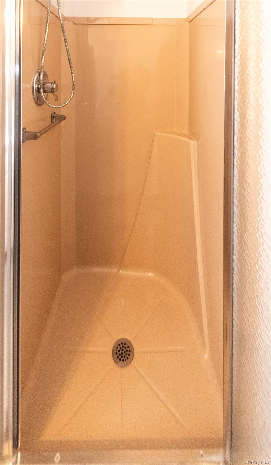 113 Village Road, Unit B Yorktown Heights, NY 10598 - Photo 21 of 25 a bathroom with a shower