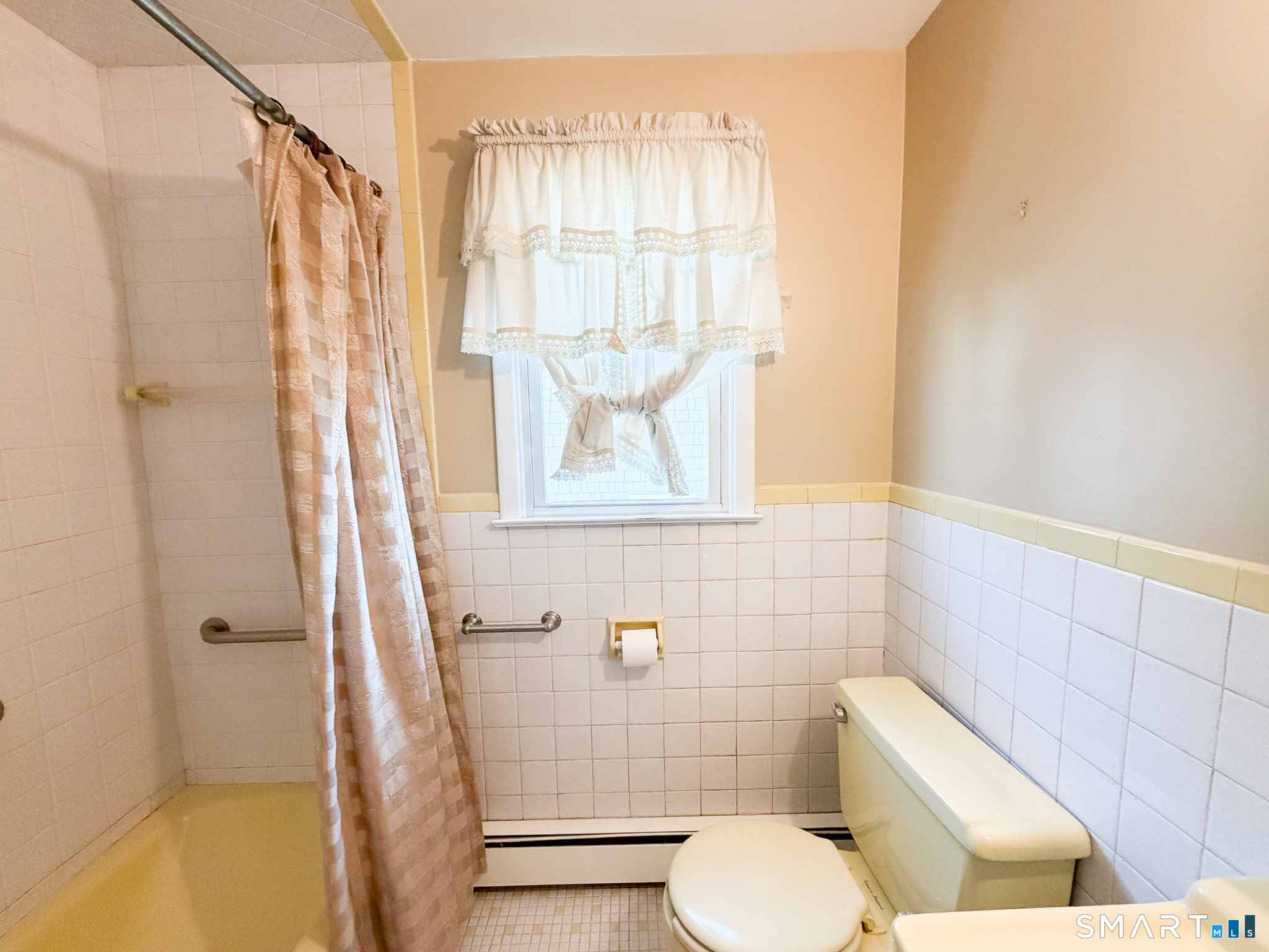 732 Tunxis Hill Road Fairfield, CT 06825 - Photo 14 of 21 a bathroom with a toilet and a shower