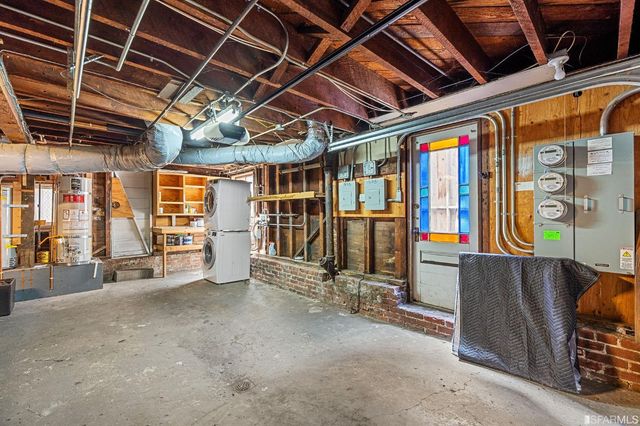 a view of an empty room with wooden roof