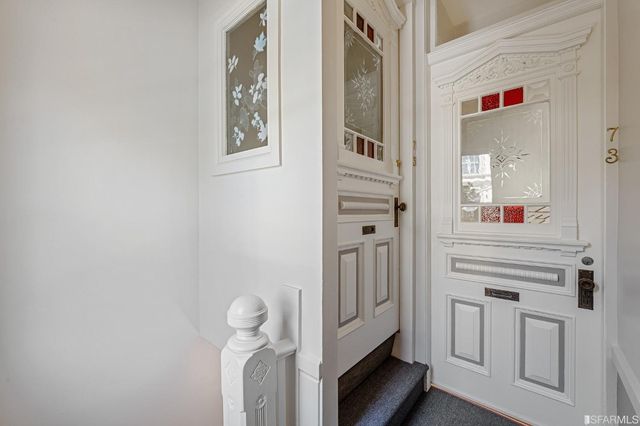 a view of a hallway with entryway