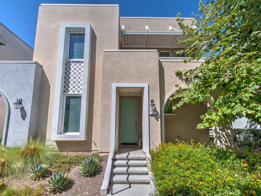 147 Acamar Irvine, CA 92618 - Photo 1 of 52 front view of a house with a yard