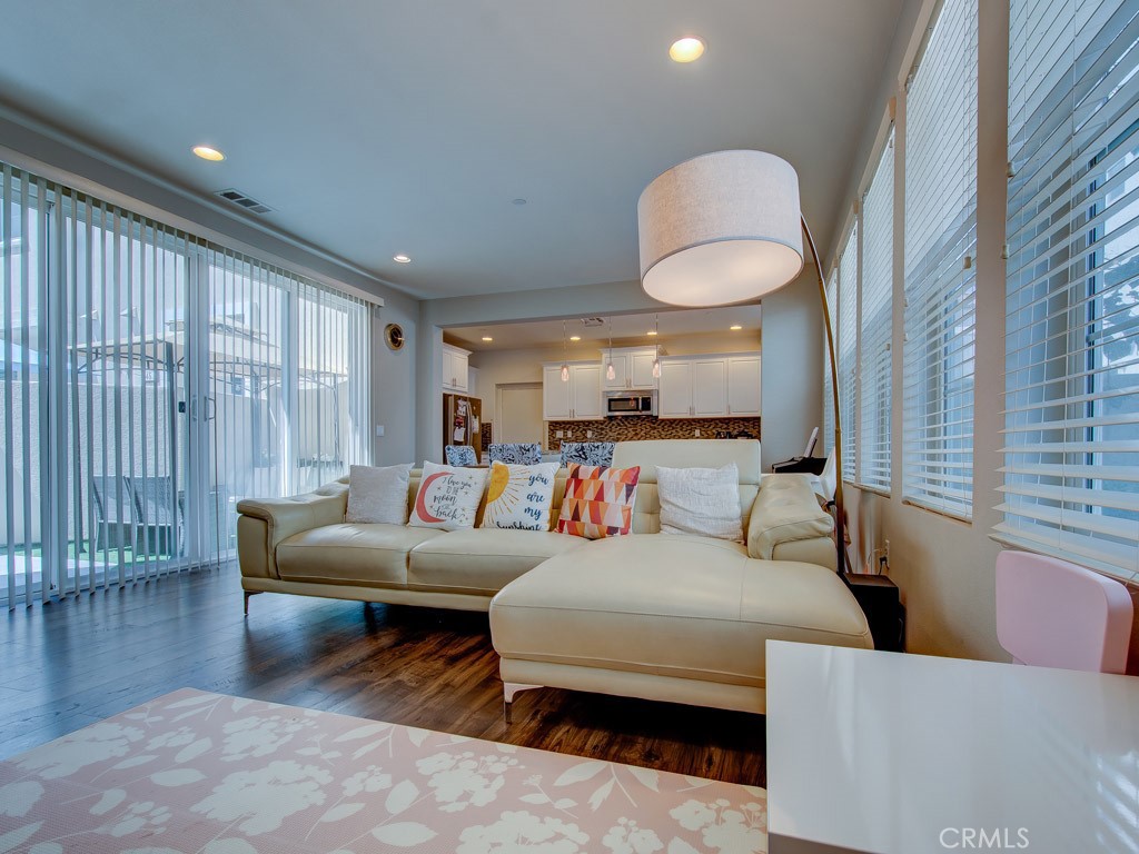 147 Acamar Irvine, CA 92618 - Photo 13 of 52 a living room with furniture and a large window