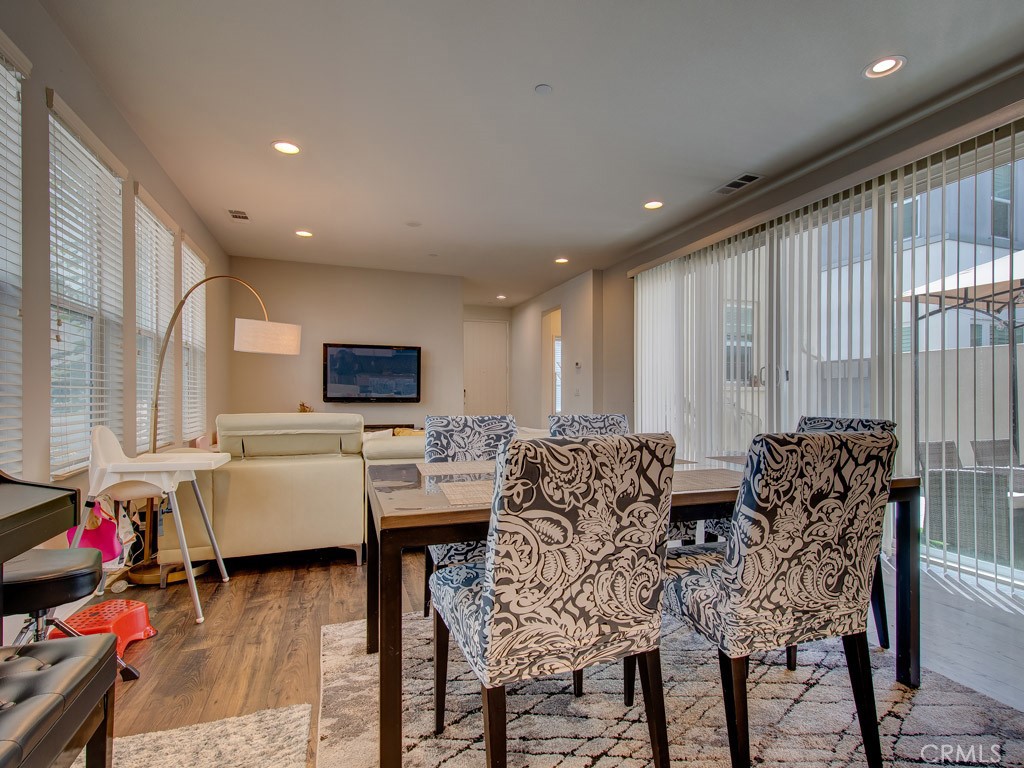147 Acamar Irvine, CA 92618 - Photo 14 of 52 a living room with furniture and a flat screen tv