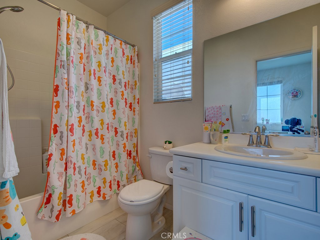 147 Acamar Irvine, CA 92618 - Photo 32 of 52 a bathroom with a sink toilet and shower