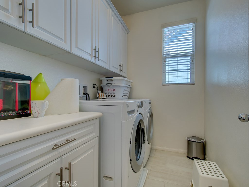 147 Acamar Irvine, CA 92618 - Photo 36 of 52 a utility room with dryer and washer