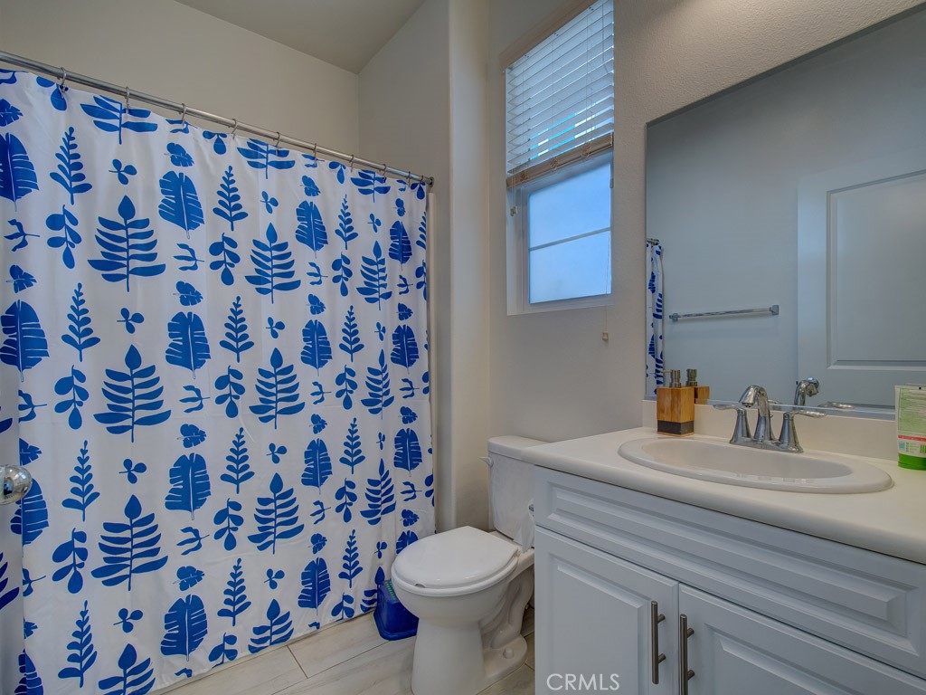 147 Acamar Irvine, CA 92618 - Photo 45 of 52 a bathroom with a sink and toilet