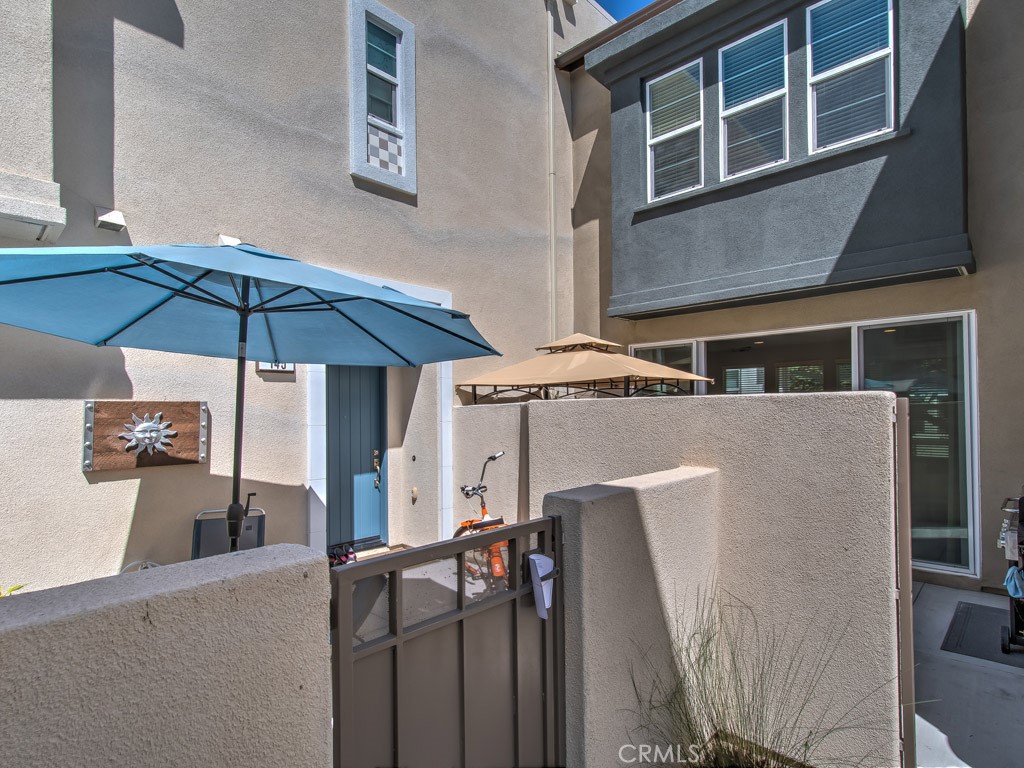147 Acamar Irvine, CA 92618 - Photo 51 of 52 a patio with table and chairs