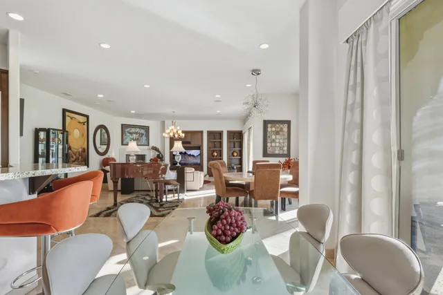 a kitchen with stainless steel appliances granite countertop a stove a sink dishwasher a microwave oven with granite countertops and cabinets