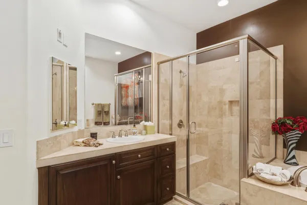 a bathroom with a double vanity sink mirror and double