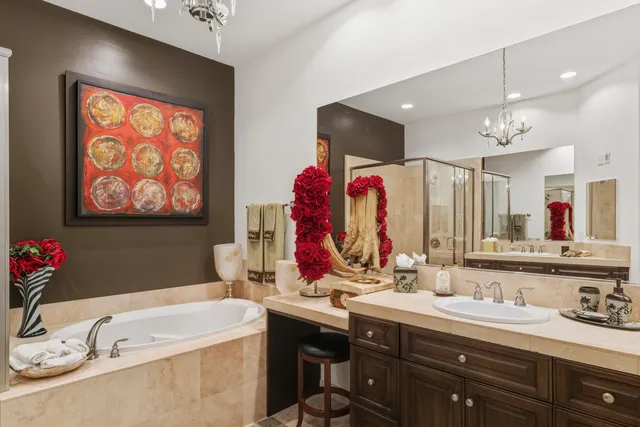 a bedroom with bed and wooden floor