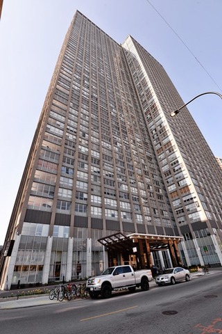 655 West Irving Park Road, Unit 312 Chicago, IL 60613 - Photo 1 of 10 a view of a tall building