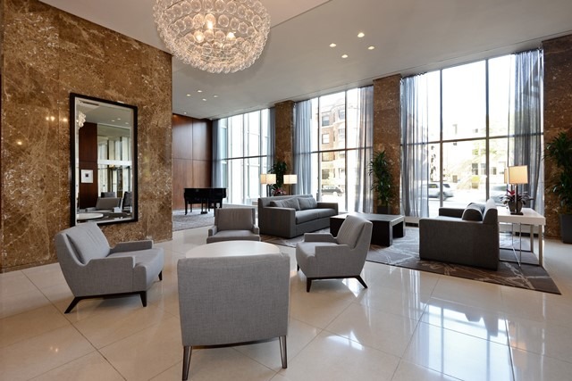 655 West Irving Park Road, Unit 312 Chicago, IL 60613 - Photo 2 of 10 a living room with furniture and a large window