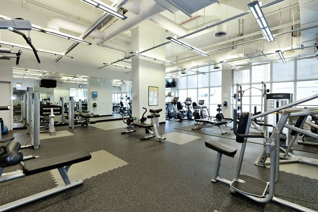 655 West Irving Park Road, Unit 312 Chicago, IL 60613 - Photo 9 of 10 a view of a room with gym equipment