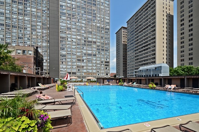 655 West Irving Park Road, Unit 312 Chicago, IL 60613 - Photo 10 of 10 a view of swimming pool with outdoor seating