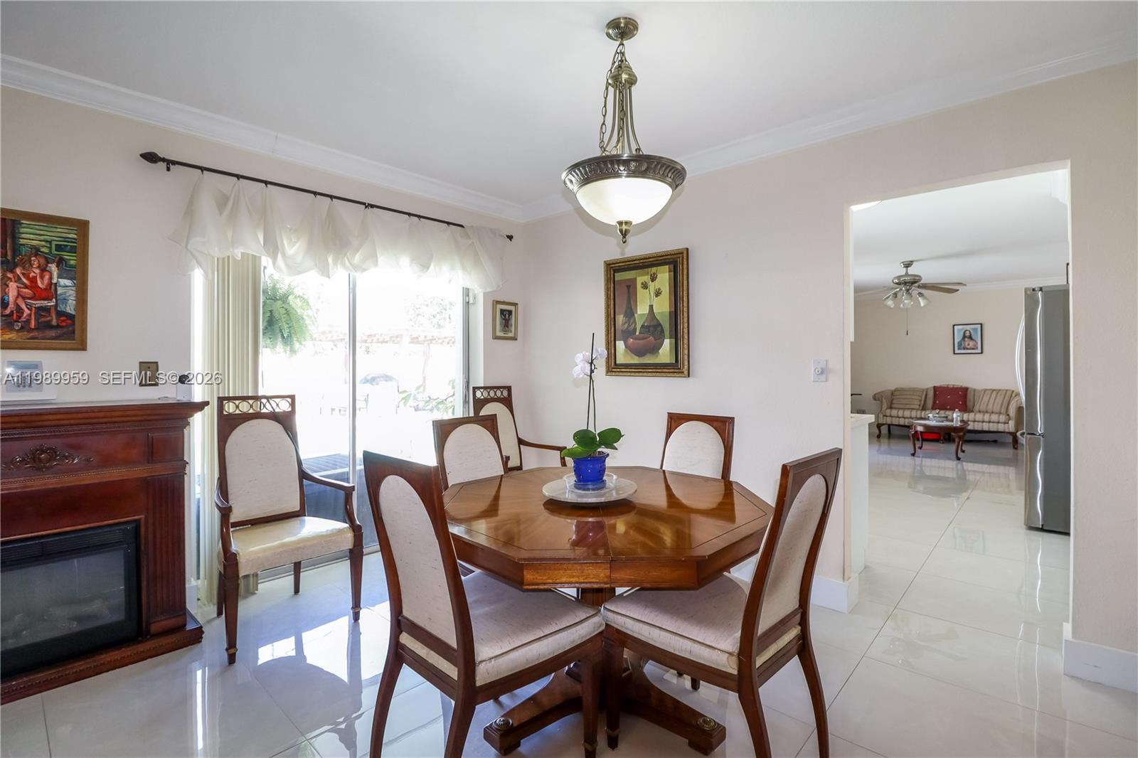 10941 Southwest 180th Street Miami, FL 33157 - Photo 11 of 29 a dining room with furniture and window