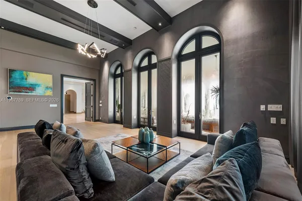 a spacious bedroom with a bed and a couch