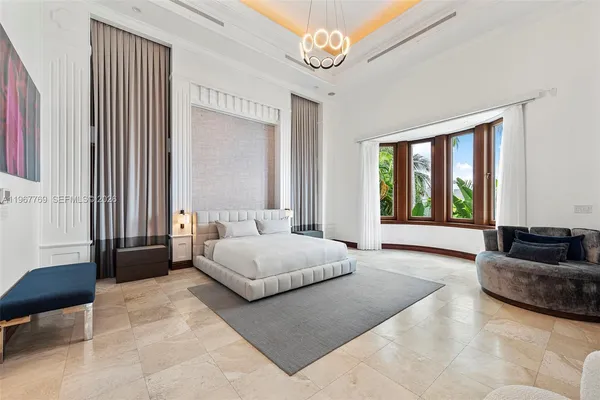 a bathroom with a bathtub and window