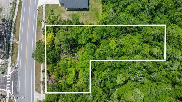 a view of a wooden fence