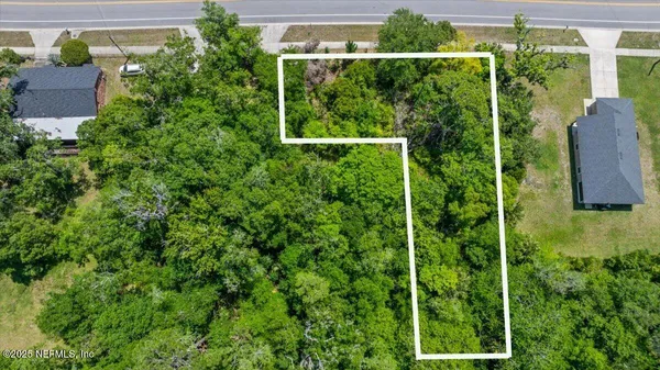 a view of a garden from a balcony
