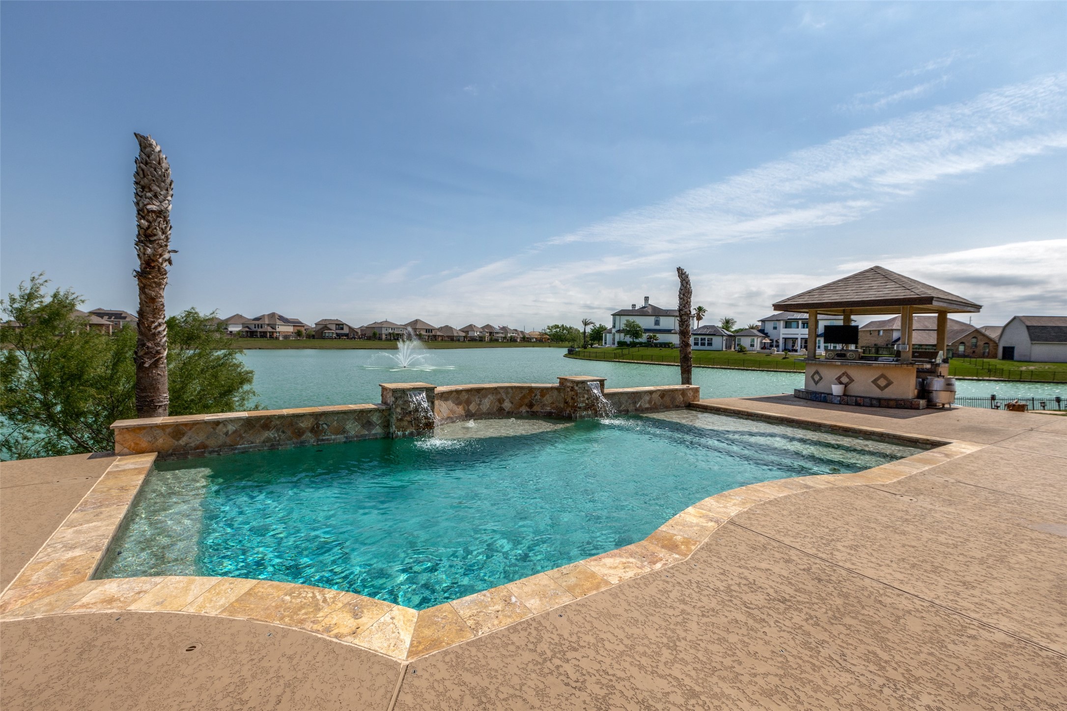 8 Cypress Point Court Manvel, TX 77578 - Photo 1 of 18 a view of a park with large trees