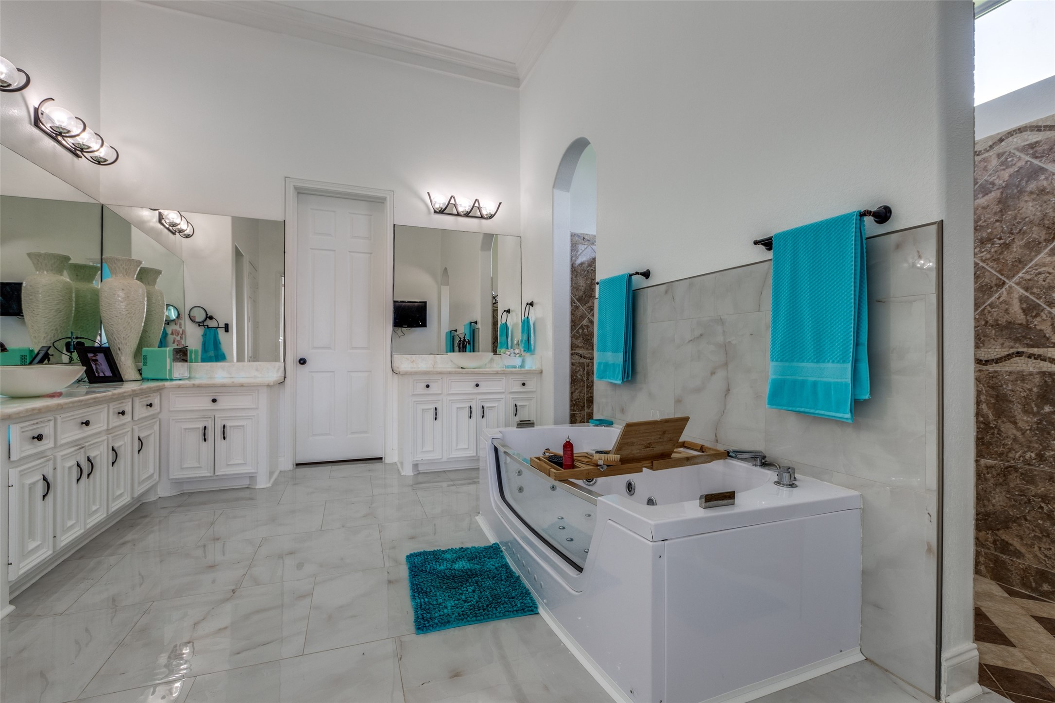 8 Cypress Point Court Manvel, TX 77578 - Photo 11 of 18 a room with cabinets and washer dryer