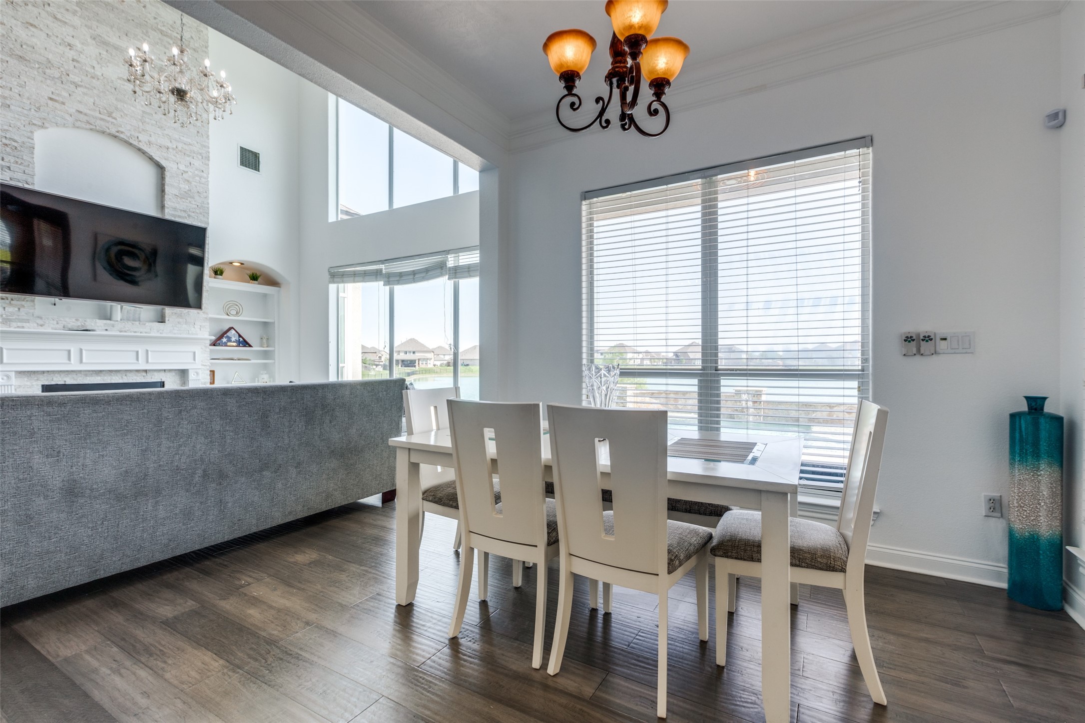8 Cypress Point Court Manvel, TX 77578 - Photo 16 of 18 a view of a dining room with furniture window and wooden floor