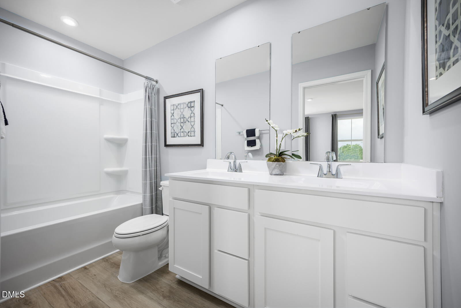 211 Brook Bawn Road Wendell, NC 27591 - Photo 12 of 25 a bathroom with a sink toilet and shower