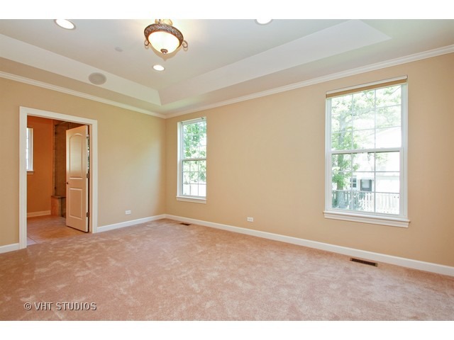 287 Hickory Road Lake Zurich, IL 60047 - Photo 12 of 25 a view of an empty room with a window