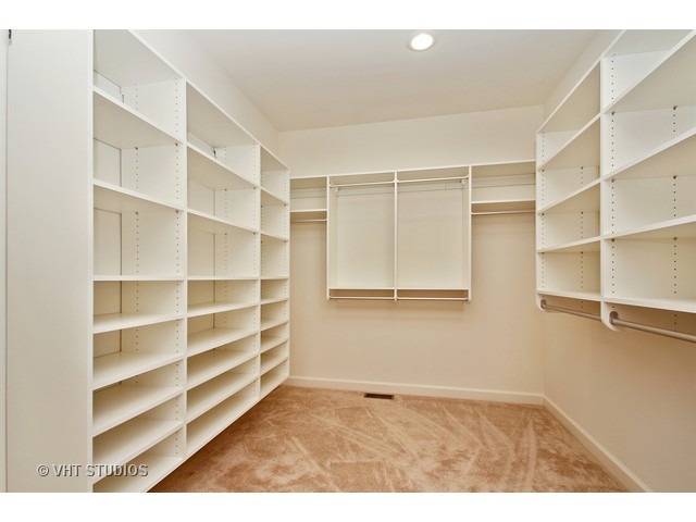 287 Hickory Road Lake Zurich, IL 60047 - Photo 13 of 25 a view of an empty room with empty racks