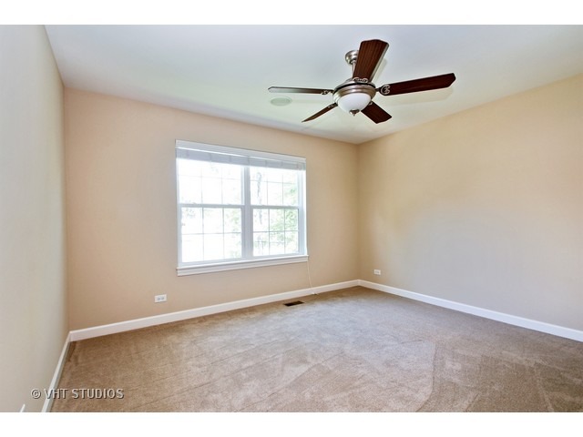 287 Hickory Road Lake Zurich, IL 60047 - Photo 15 of 25 an empty room with windows