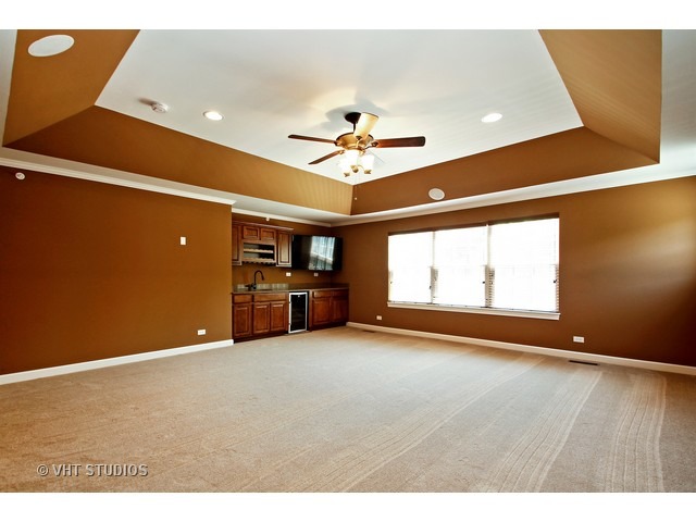 287 Hickory Road Lake Zurich, IL 60047 - Photo 8 of 25 a view of an empty room with a window