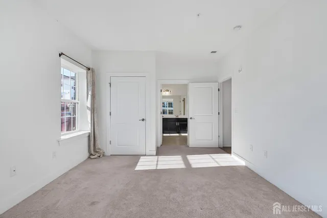 a view of an empty room with window